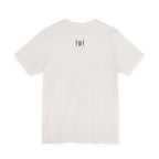 A white short-sleeve crewneck t-shirt with a small black 'Humble + Hopeful' logo printed on the upper chest, displayed against a solid white background.