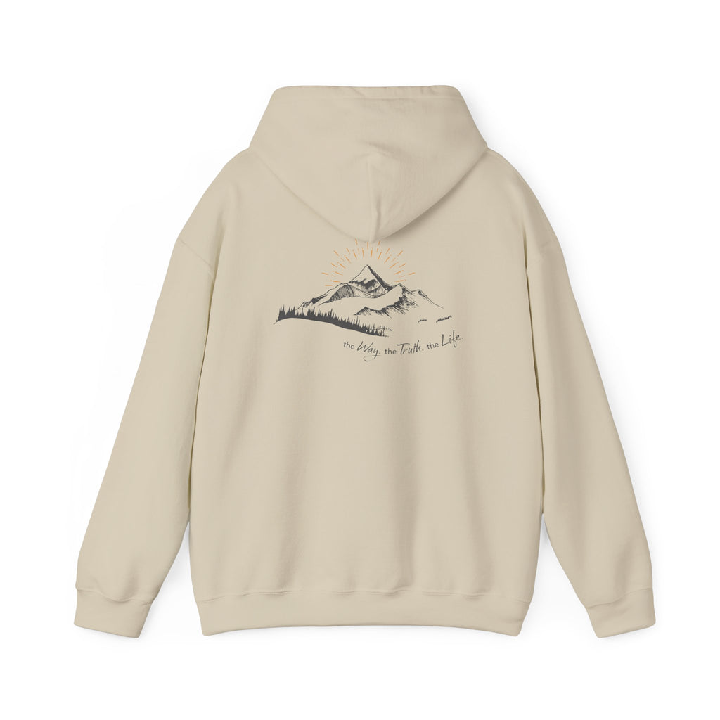 A beige hooded sweatshirt shown from the back, with a mountain with a rising sun and the Way, the Truth, the Life text printed underneath the graphic on a white background.