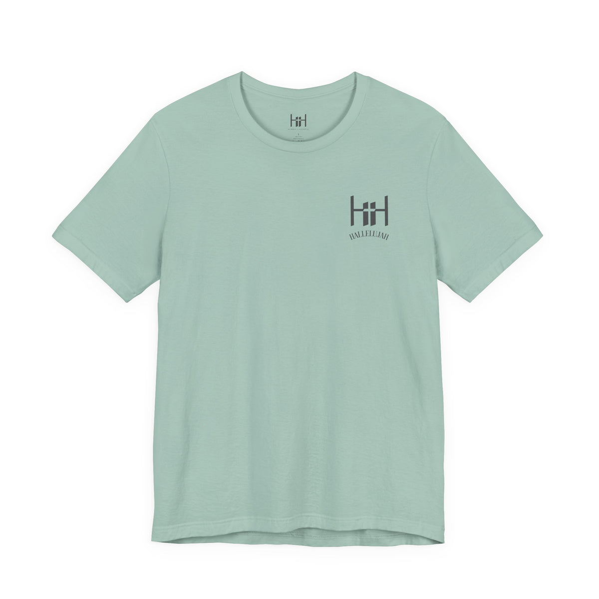 the front of a dusty blue t-shirt with the Humble + Hopeful logo on it