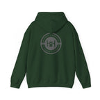 Forest green hoodie with 'Humble+Hopeful' logo on the back against a white background