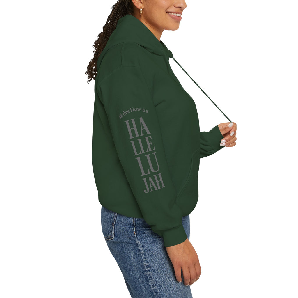 green colored hoodie with a Humble + Hopeful logo on the front and Hallelujah on the sleeve on a white background