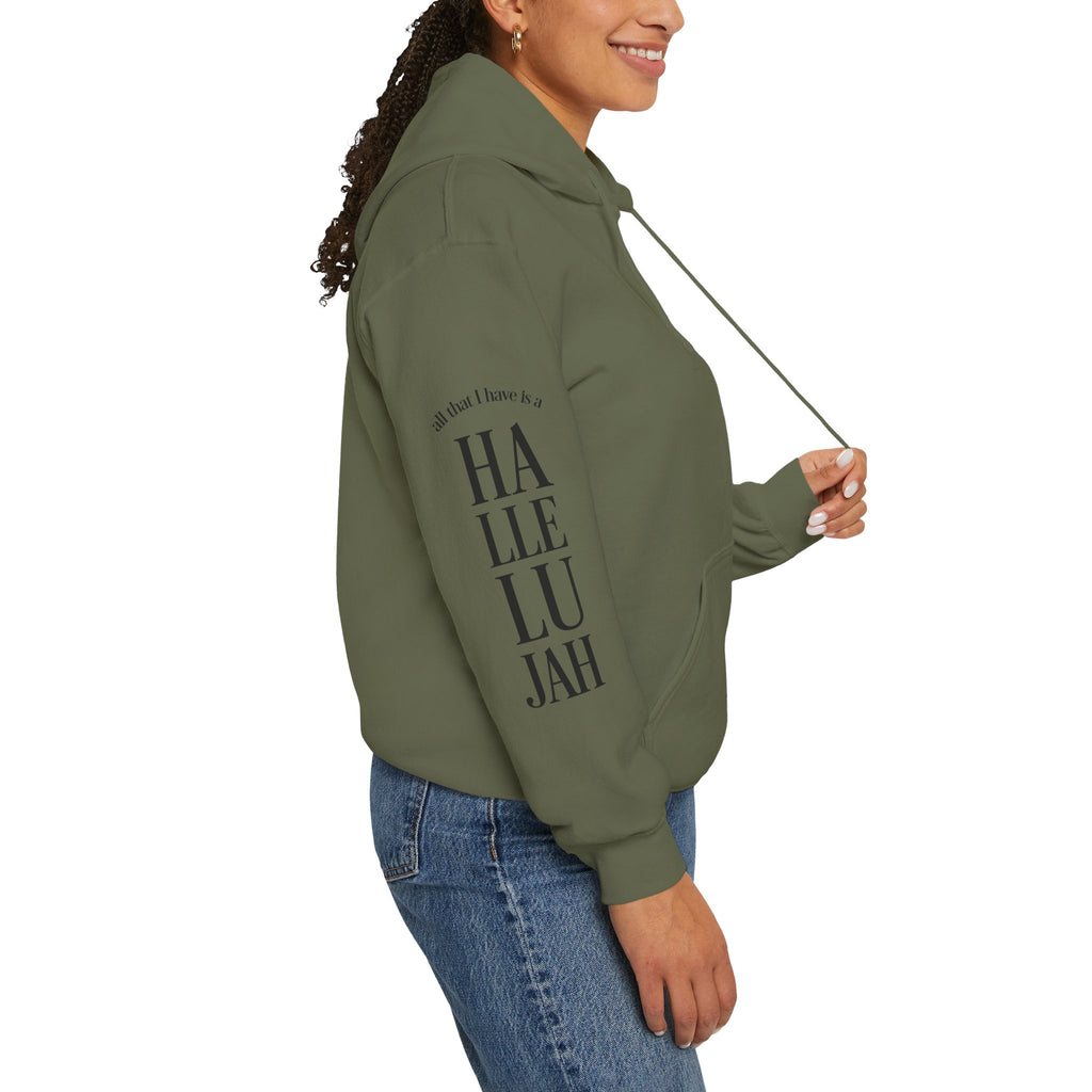 green colored hoodie with a Humble + Hopeful logo on the front and Hallelujah on the sleeve on a white background
