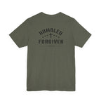 green t-shirt with 'Humbled+Forgiven' text on the back against a white background