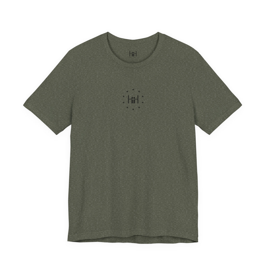 Green t-shirt with the Humble + Hopeful Logo on a white background