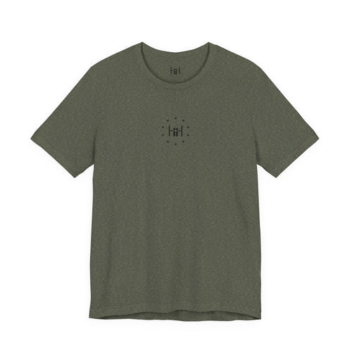 Green t-shirt with the Humble + Hopeful Logo on a white background