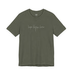 military green t-shirt with 'hope began here' text on a white background