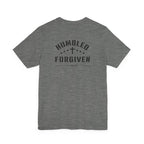 grey t-shirt with 'Humbled+Forgiven' text on the back against a white background