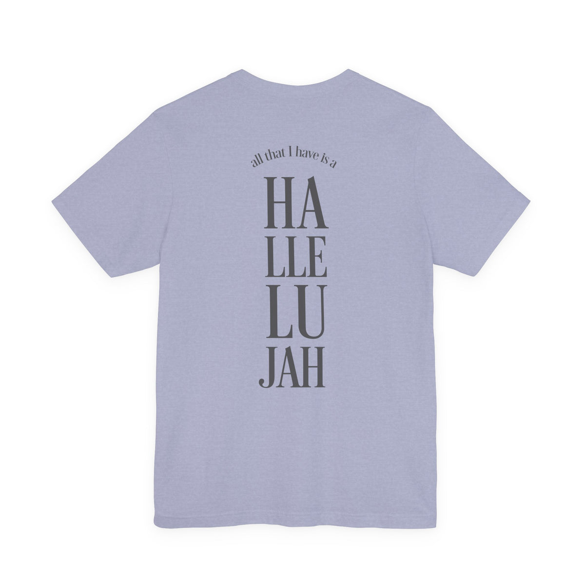 A light periwinkle blue short-sleeve t-shirt shown from the back, featuring a vertical graphic print that reads 'all that I have is a HÄLLELUJAH' in dark gray lettering.