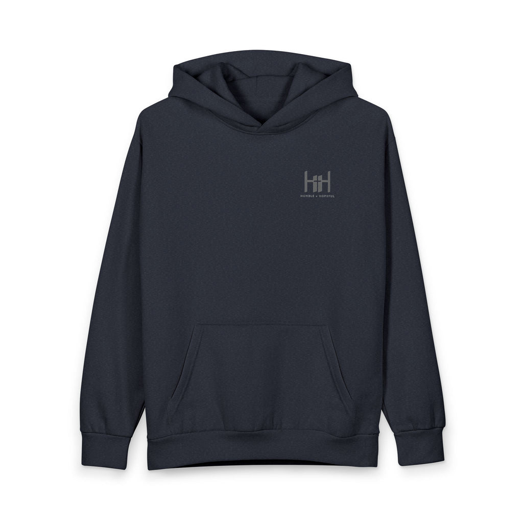 Navy hoodie with 'Humble+Hopeful' logo on the back against a white background