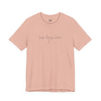 peach t-shirt with 'hope began here' text on a white background
