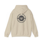 Sand hoodie with 'Humble+Hopeful' logo on the back against a white background