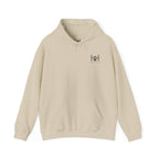 Sand hoodie with 'Humble+Hopeful' logo on the back against a white background
