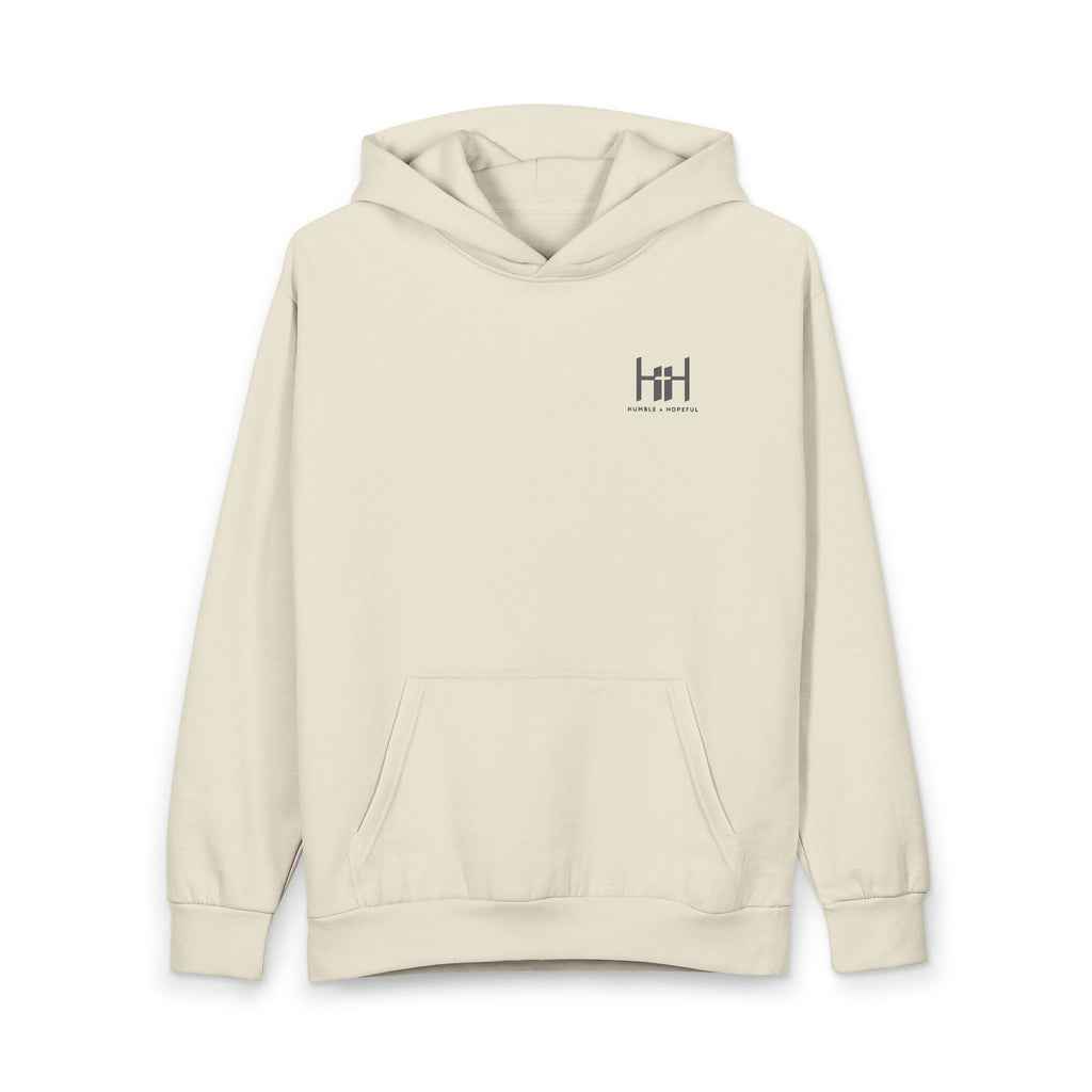 Sandshell colored hoodie with 'Humble+Hopeful' logo on the back against a white background