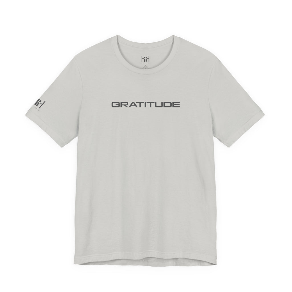 silver t-shirt with GRATITUDE written on the front