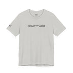 silver t-shirt with GRATITUDE written on the front