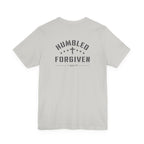 silver t-shirt with 'Humbled+Forgiven' text on the back against a white background