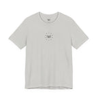 silver t-shirt with the Humble + Hopeful logo on the front