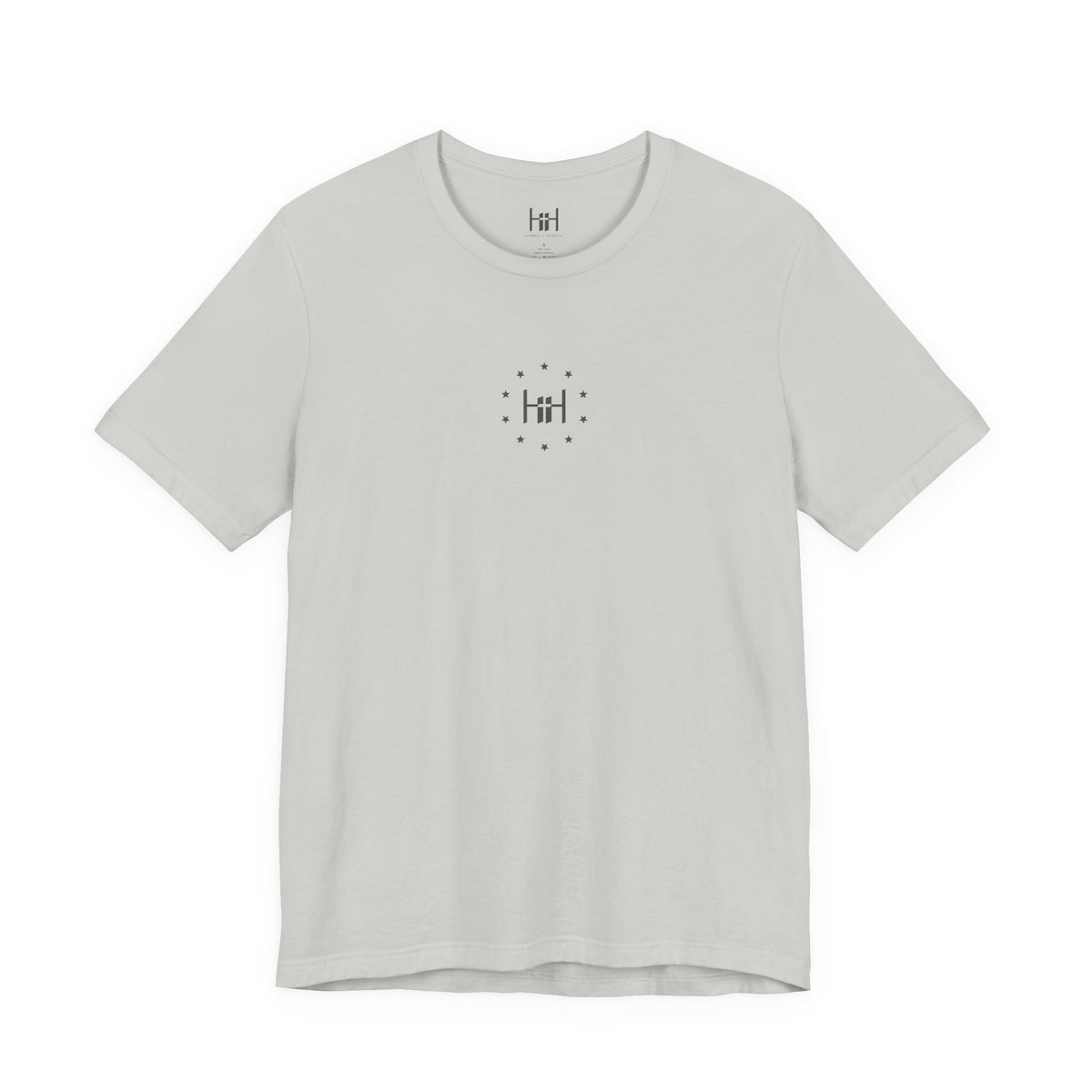 silver t-shirt with the Humble + Hopeful logo on the front