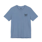 Steel Blue t-shirt with Humble + Hopeful logo on the front on a white background