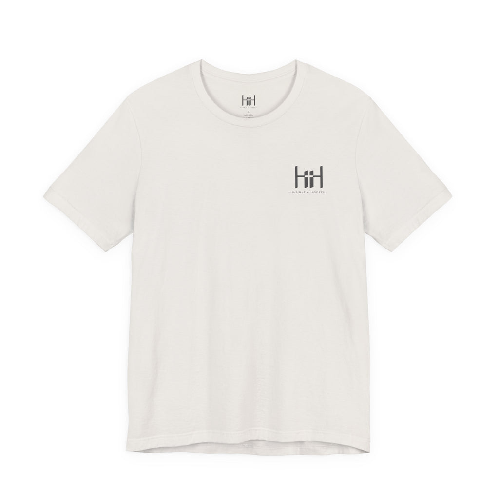 white t-shirt with 'Humble+Hopeful' logo on a white background