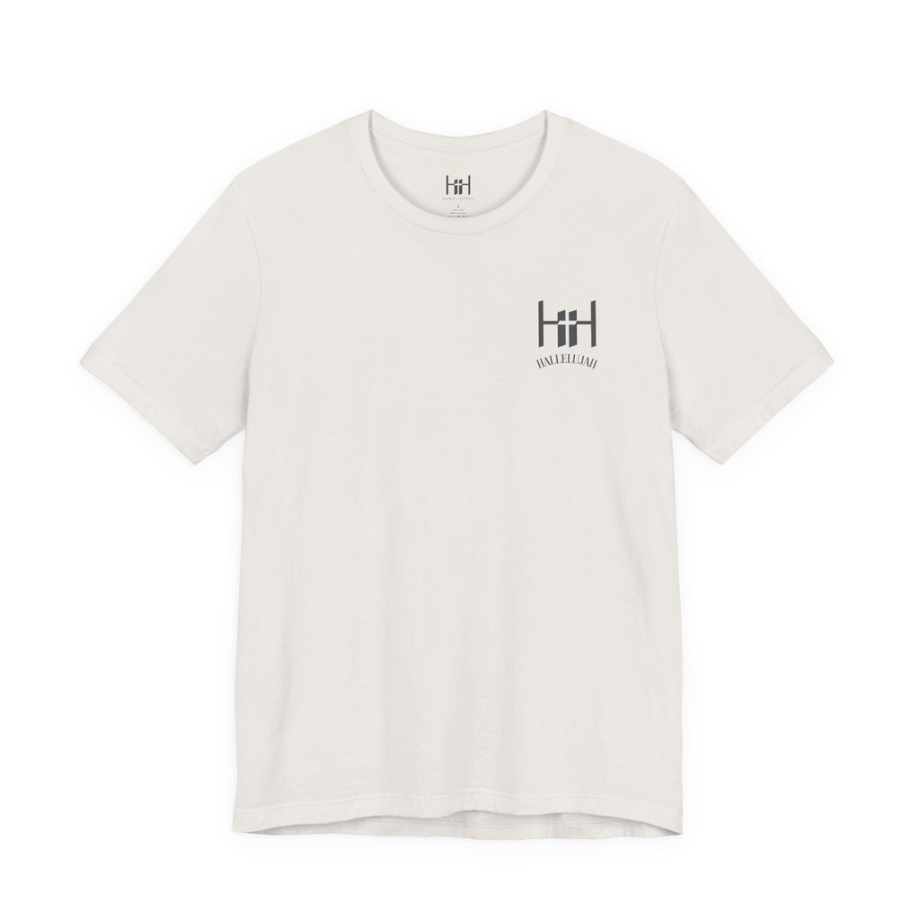 A short-sleeve crewneck t-shirt in off-white, featuring a dark gray 'Humble+Hopeful' logo printed on the left chest.