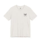 A short-sleeve crewneck t-shirt in off-white, featuring a dark gray 'Humble+Hopeful' logo printed on the left chest.